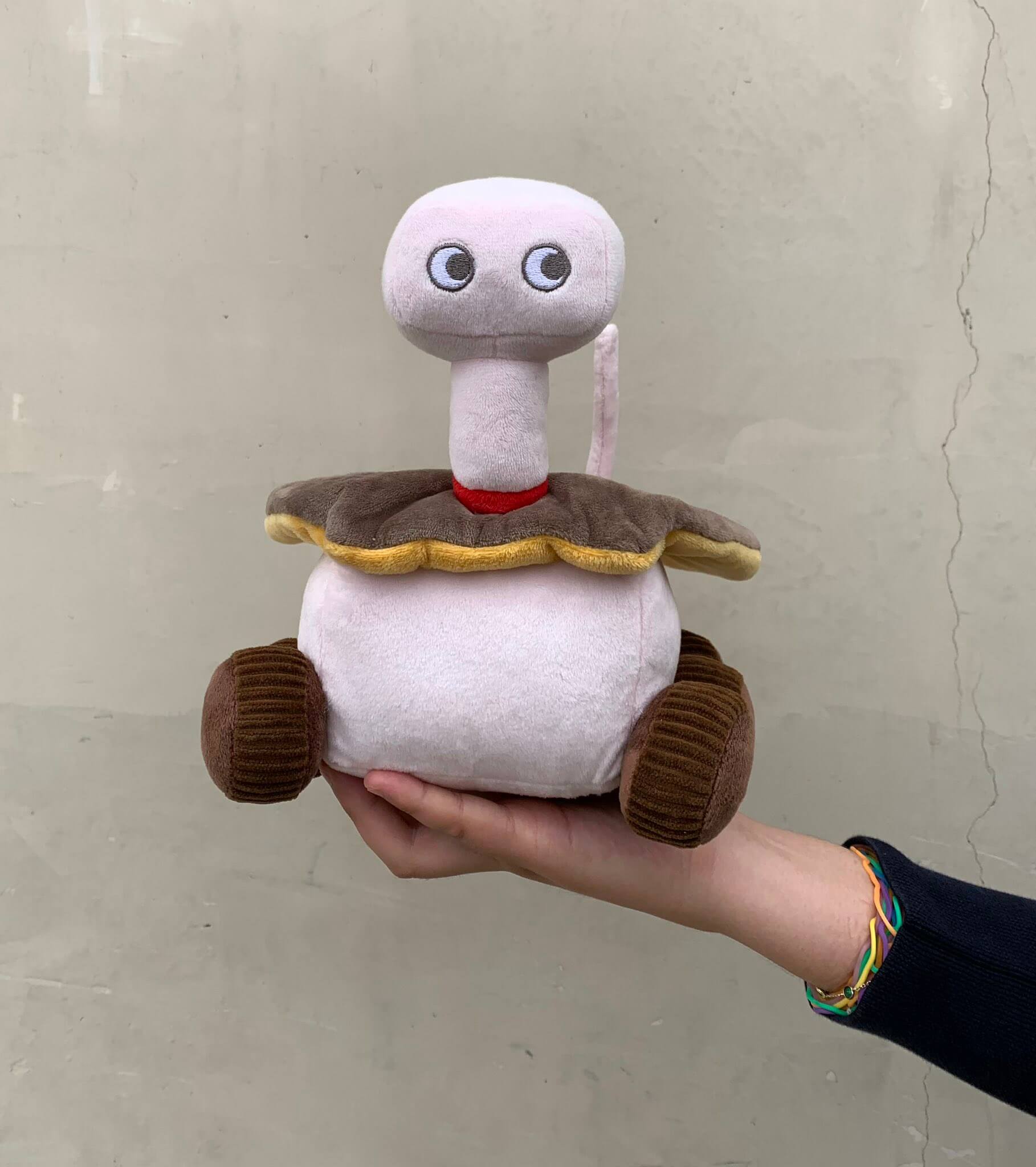 Plush products in the image of the Opportunity rover